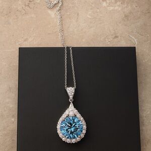 Elegant Silver and Blue Pendant Necklace